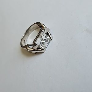 Sterling silver x ring with white cz center